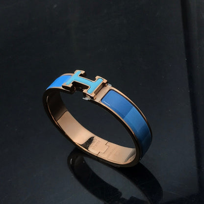 [Super Jewellery]H BRACELET BLUE RAINBOW CERAMIC