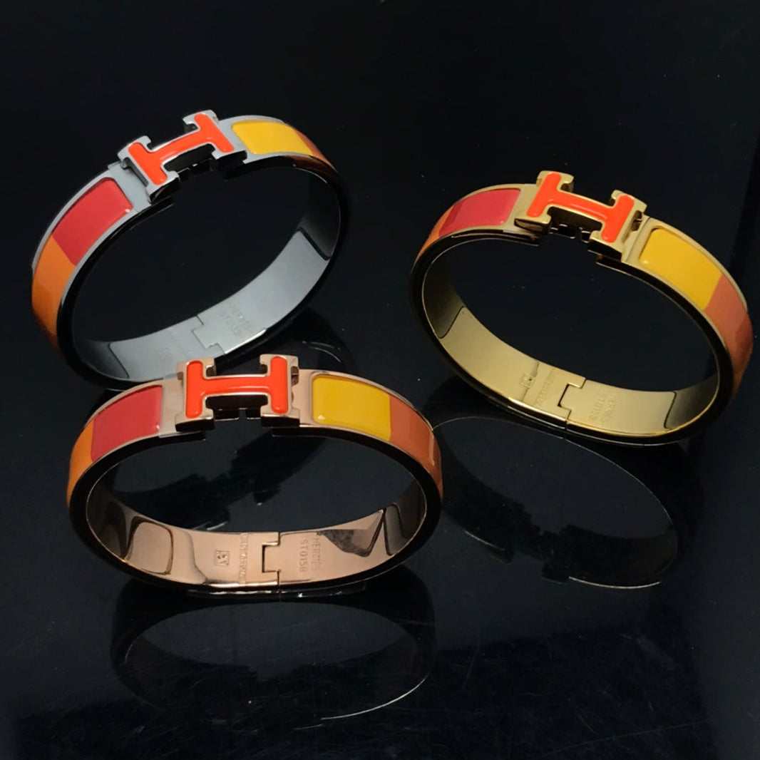 [Super Jewellery]H BRACELET ORANGE RAINBOW CERAMIC