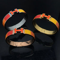 [Super Jewellery]H BRACELET ORANGE RAINBOW CERAMIC