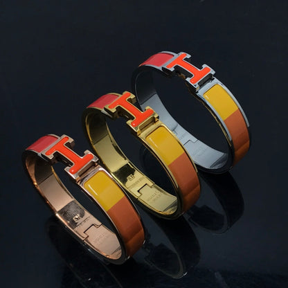 [Super Jewellery]H BRACELET ORANGE RAINBOW CERAMIC