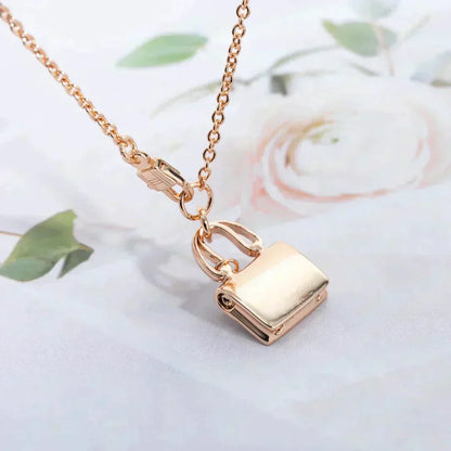 [Super Jewellery]AMULETTE PEDANT ROSE GOLD NECKLACE