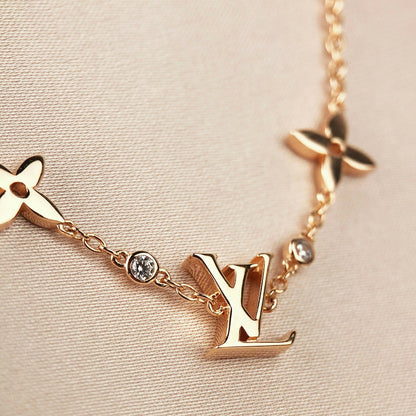 [Super Jewellery]STAR AND SUN 7 MOTIFS GOLD BRACELET