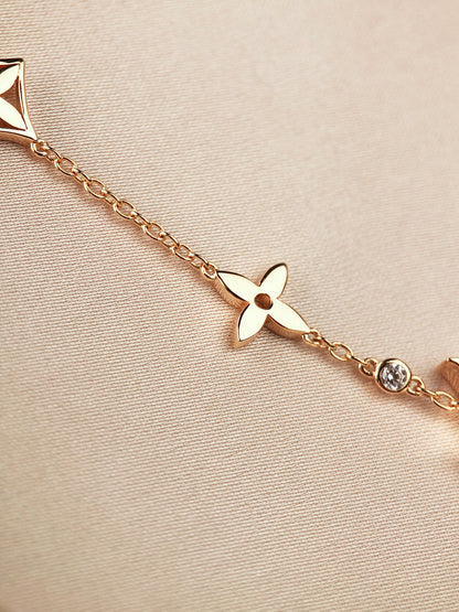 [Super Jewellery]STAR AND SUN 7 MOTIFS GOLD BRACELET