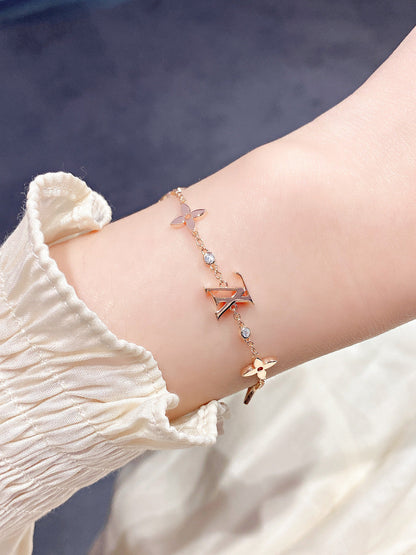 [Super Jewellery]STAR AND SUN 7 MOTIFS GOLD BRACELET
