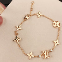[Super Jewellery]STAR AND SUN 7 MOTIFS GOLD BRACELET