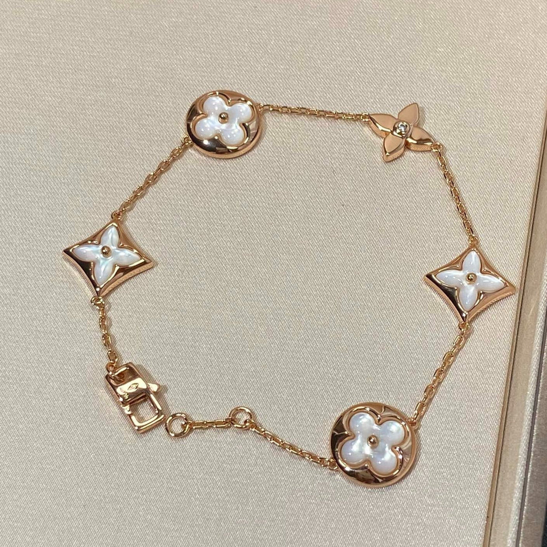 [Super Jewellery]STAR AND SUN 5 MOTIF MOP PINK GOLD BRACELET