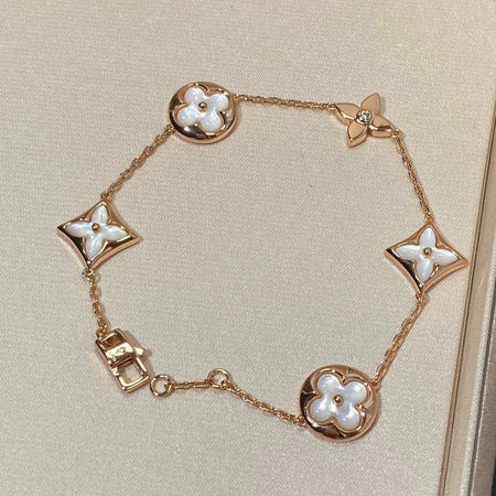 [Super Jewellery]STAR AND SUN 5 MOTIF MOP PINK GOLD BRACELET