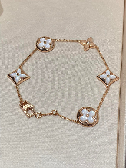 [Super Jewellery]STAR AND SUN 5 MOTIF MOP PINK GOLD BRACELET