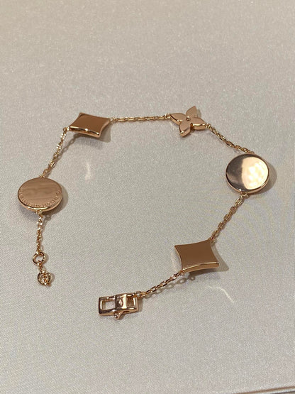 [Super Jewellery]STAR AND SUN 5 MOTIF MOP PINK GOLD BRACELET