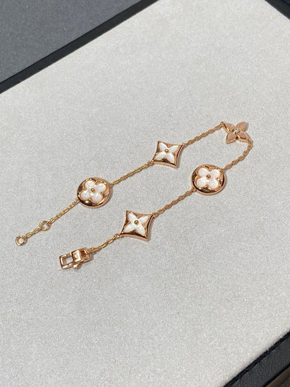 [Super Jewellery]STAR AND SUN 5 MOTIF MOP PINK GOLD BRACELET