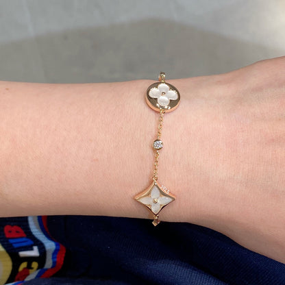 [Super Jewellery]STAR AND SUN 4 MOTIF WHITE MOP PINK GOLD BRACELET