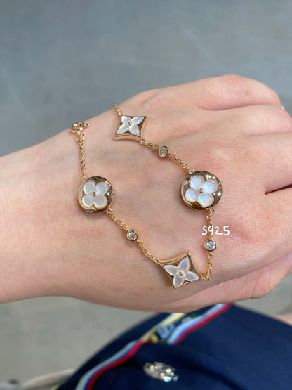 [Super Jewellery]STAR AND SUN 4 MOTIF WHITE MOP PINK GOLD BRACELET