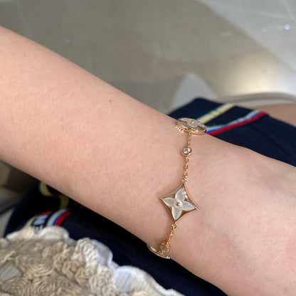 [Super Jewellery]STAR AND SUN 4 MOTIF WHITE MOP PINK GOLD BRACELET