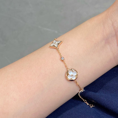 [Super Jewellery]STAR AND SUN 4 MOTIF WHITE MOP PINK GOLD BRACELET
