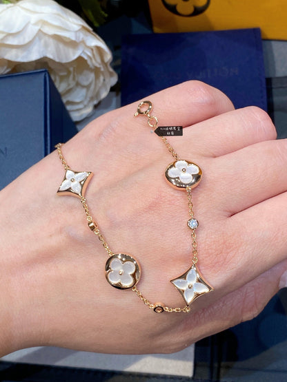 [Super Jewellery]STAR AND SUN 4 MOTIF WHITE MOP PINK GOLD BRACELET