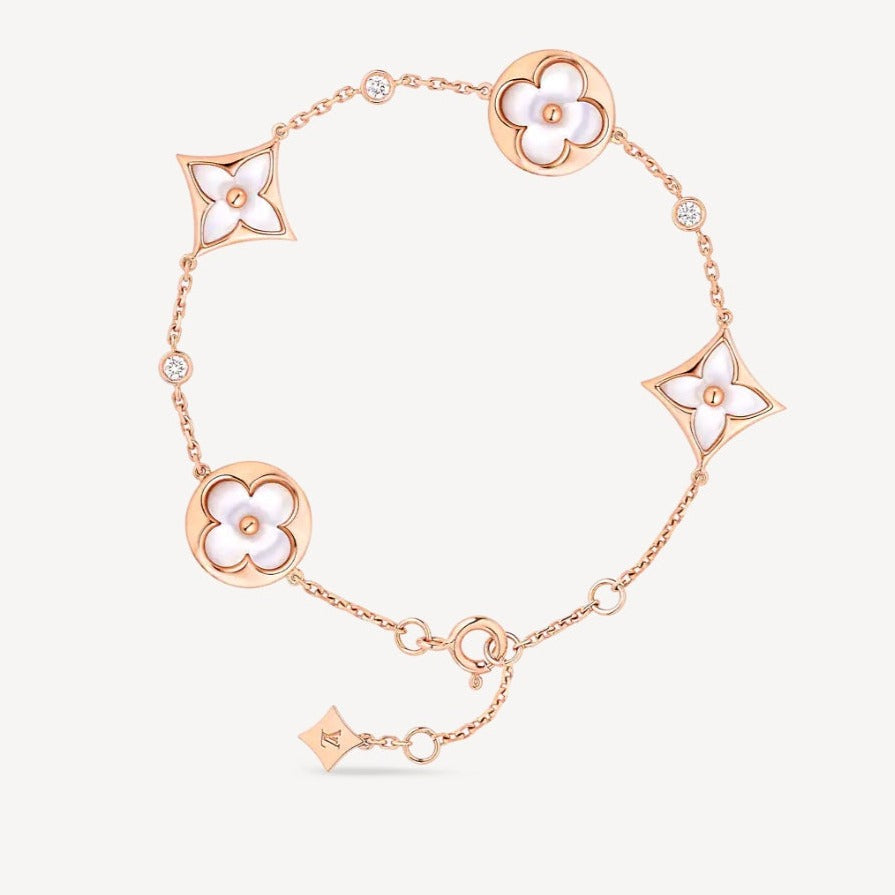 [Super Jewellery]STAR AND SUN 4 MOTIF WHITE MOP PINK GOLD BRACELET