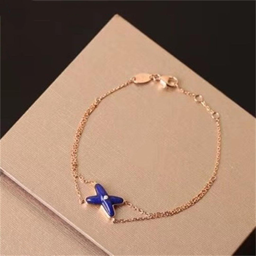 [Super Jewellery]Hollow Design Four-Leaf Clover Flower Shape Bracelet